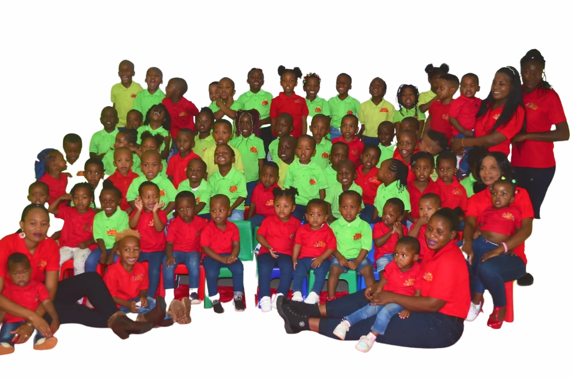 Chosen Angel Centre creche teachersv and their students posing for a photo in the garden